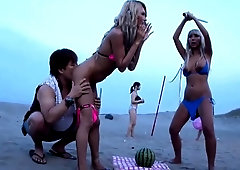 Wild Asian babes indulge in kinky sex action on the beach
