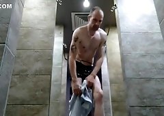 Puplic Place Naked. Skinny Fit Body Flexing And Taking A Shower In City Puplic Showers