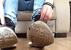 Taking off black dirty socks, sock fuzz and dirty feet