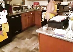 Chunky granny with large, saggy melons is widening her legs wide open on the bed