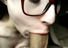 Nerdy teen sucks a huge cock and takes a mouthful of cum