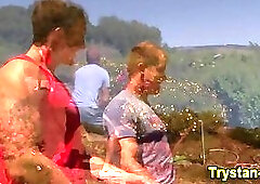 Muscly hunks get hard outdoors