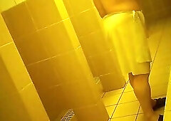 Naked men in public pool shower