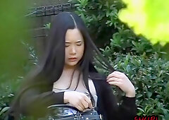 Asian cutie gets her clothes stripped during public sharking