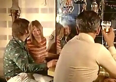 A classic German cuckold scene with a hotwife enjoying a threesome, embracing the vintage era's passion with a cuckold husband.