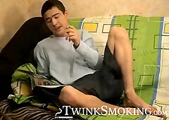 Young Marivelli hops on the couch and starts his smoking and jerking session