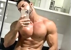 Stroking a huge cock