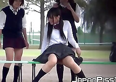 Pervy guy films three Japanese peeing outside
