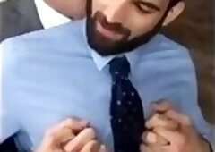 Boss kissing his lover in the office