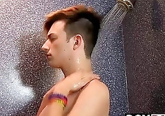 Soapy boy bouncing on a dildo in the shower