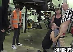 Mature man bent over and drilled by car shop workers