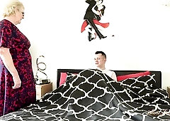 Breasty 66 year-old Aged GILF Mrs. Claire catches her stepson's ally in her daybed and resolves to put him to worthwhile use. That babe knows it&