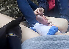 public footjob and socksjob in the forest