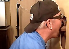 Gloryhole tattooed gay sucks hard cock and deepthroats it