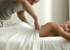 Blond teen enjoying a priceless massage previous to getting hard screwed on the table.