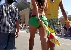 Candid scene with brunette in tiny top at a festival