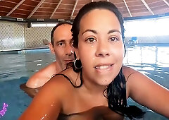 Voluptuous brunette MILF caught in steamy indoor pool encounter with multiple lovers