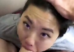 Young asian teen gives a face fucking blowjob