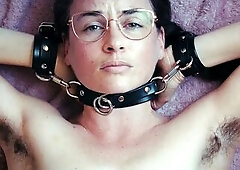 As seen from above, Creature Marie is collared with her leather cuffs attached at the sides, preventing her from using her hands to climax. U can hear