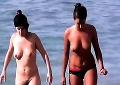 Beach voyeur spying on amateur naked women sunbathing