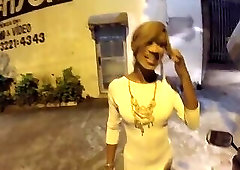 Tranny showing ass on the street