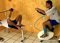 Horny football guys barebacking at the gym
