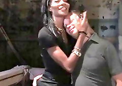 Slim ebony tranny Mistress in stockings sodomizes the restrained whitey