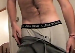 unshaved guy grabs his rock solid prick and jacks solo