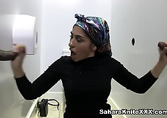 Hijabi Slut Sucks Strangers At The Gloryhole