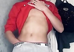 Cheeky gay twink from Australia in hoodies jerks his dick off and cums