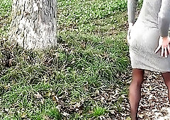 Debaucherous shemale with a big booty plays around in outdoors