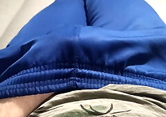 A stud in blue sweatpants caresses his swelling