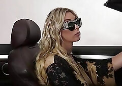 Blonde shemale sucks a dick while masturbating in her car