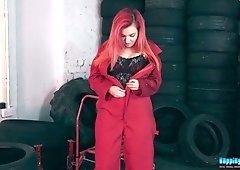Red haired hooker Dolly shows striptease in the tire shop