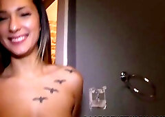 Amateur brunette is sucking a random dick through a gloryhole, just for the fun of it