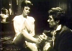 A super sexy brunette massages her big boobs