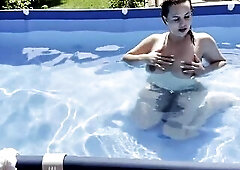 In a sunny day play in my outdoor pool . I disrobe undressed and play with my vagina , hold my breath underwater whilst recording myself with an water