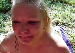 Blonde at the lakeside clearing takes cum in her mouth and pisses on demand