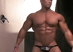 Stan Mcquay lifting weights, flexing, and posing + more