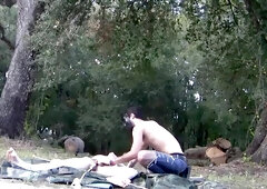 Camping bros have fun pulling each other's balls