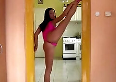 Horny gymnast plays with her hard dildo.
