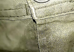 Trousers soaked in urine with a cloth diaper and a strong ammonia smell