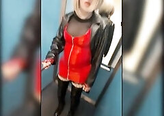 Public walk in overknee boots in a parkhouse, clothed in nylons, red pvc suit and leather coat. Sexy blond.