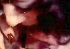 Porn legend Annie Sprinkle doing a double bj and double vag penetration. Plenty of dick-rubbing going on here! And check out that ejaculation!