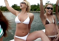 Slutty lesbian babes touching every other and rubbing cunts on the boat.
