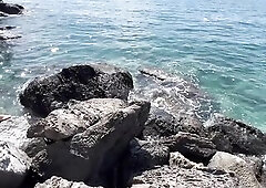 Pretty readhed banged on the beach between the rocks