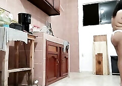 Plump beauty in a belt cooking