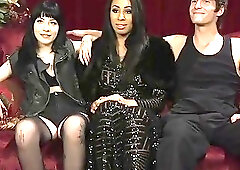 Stockinged babe and a twink analyzed by a tranny Mistress