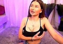 Busty curly brunette with big boobs fucks on couch