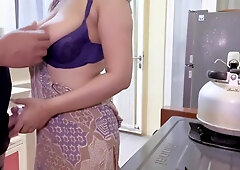 Boarding House Woman Approaches Boarding House Residents In The Kitchen